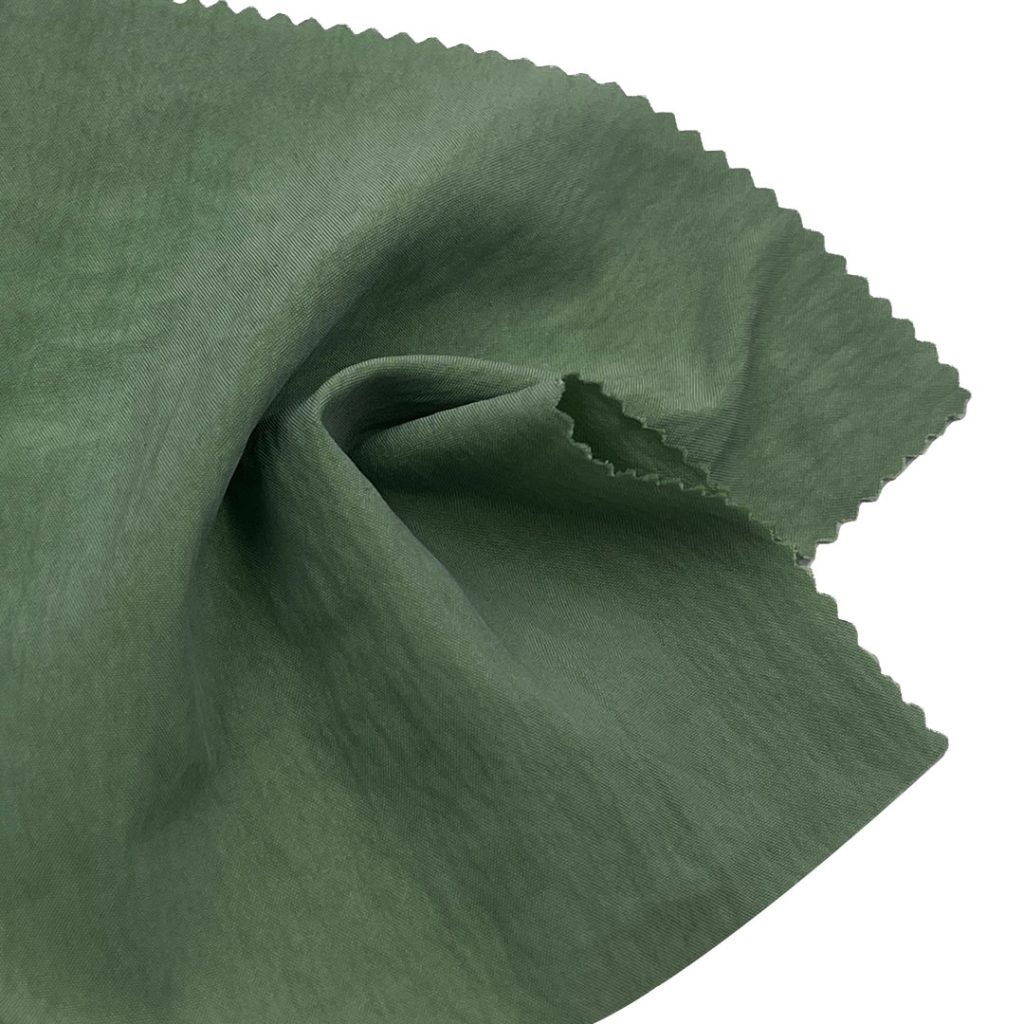 105gsm (3.7 oz) 10% Nylon 25% Polyester 65% Tencel Crêpe Translucent Textured Fabric Skirt Dress