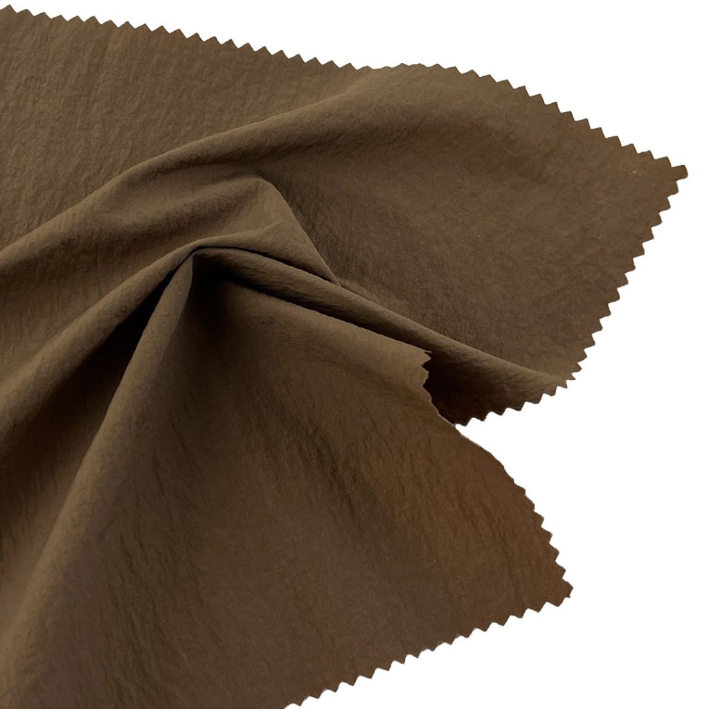 75gsm (2.6 oz) 100% Nylon Crêpe Translucent Textured Fabric Skirt Dress