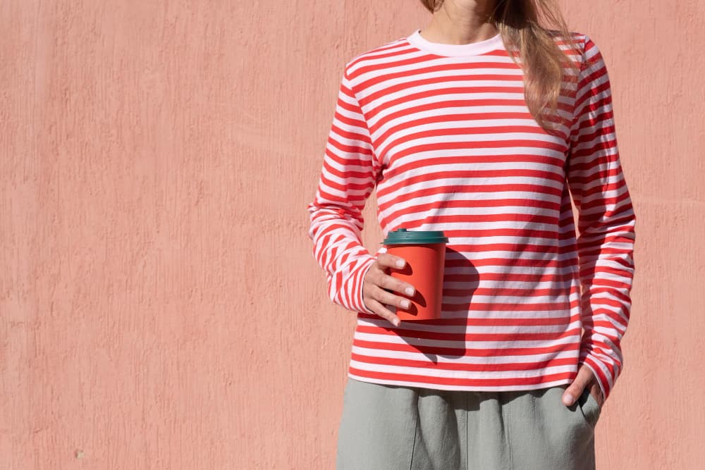 A red-and-white striped garment made from long-sleeved shirt fabric
